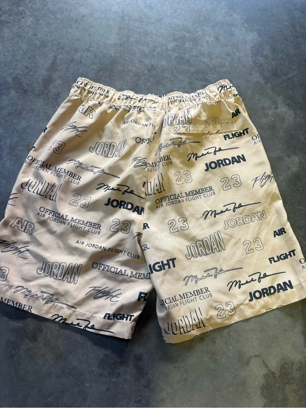 Jordan Men's Tan All-Over Logo Athletic Shorts